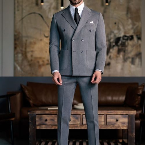 A double-breasted statement in a refined grey hue…